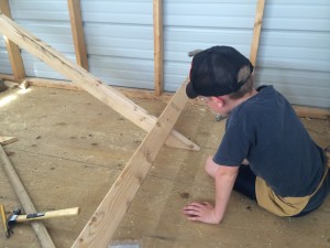 Here my son is working on the frame of our hinged roost, this will be great for when he needs to clean it out ;)